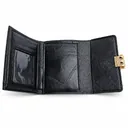 Women’s Faux Leather Wallet with Cross-Stitch Detailing and Gold-Tone Clasp