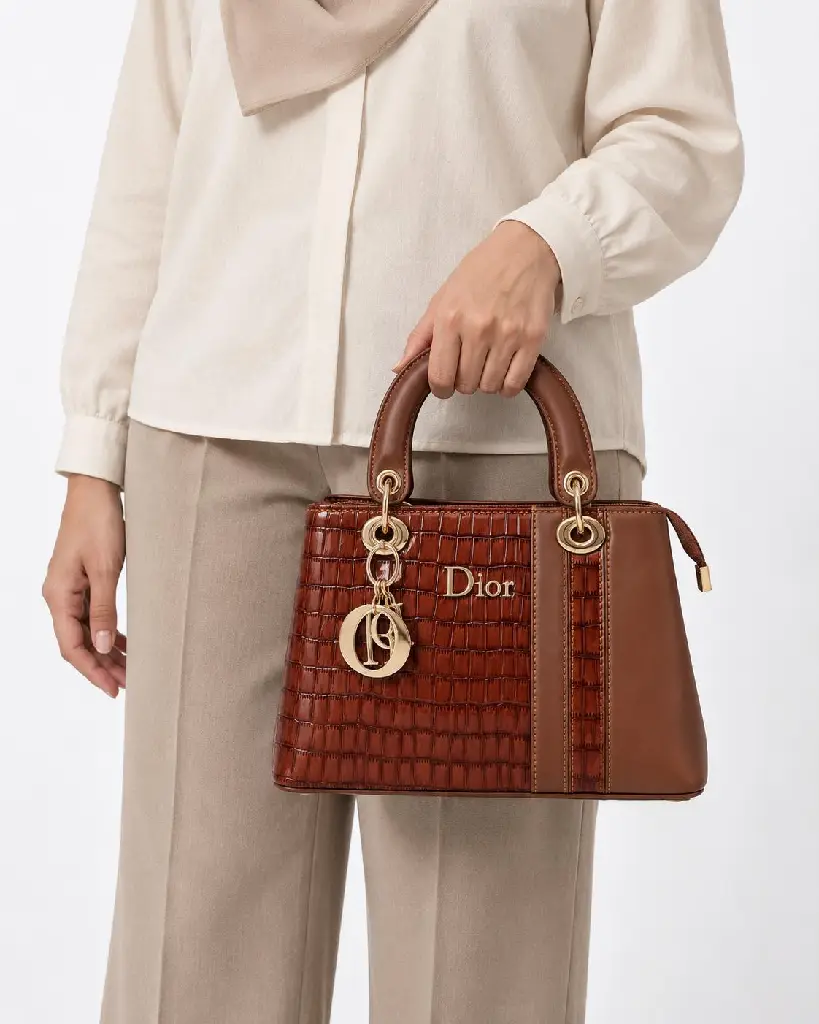 Women's Faux Leather Top-Handle Handbag with Raised Side Details and Metal Charms