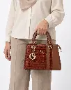 Women's Faux Leather Top-Handle Handbag with Raised Side Details and Metal Charms